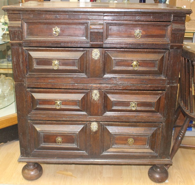 A late 17th Century joined oak chest of drawers, circa 1690, made from two sections, fitted with