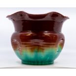 A Bretby Art Pottery medium-size jardinière decorated with yellow, red and green glazes, No. 1063
