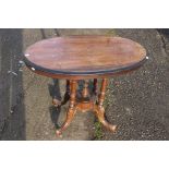 A Victorian pedestal loo table, inlaid top, raised on turned supports, 70cm high, 92cm wide, 55cm