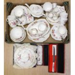 A collection of Royal Crown Derby Posie pattern tea wares including boxed items, cake stands, bowls,
