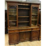 An early Victorian oak glaze topped dresser, circa 1850, the upper section with two glazed doors