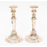 A pair of mid 20th Century electro plated candlesticks, round bases by Rand, stamped