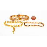 A collection of amber jewellery to include an amber chip graduated necklace, weight approx 45.3gms