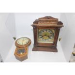 A small oak early 20th Century wall clock along with a late 19th Century mantel clock (2)