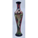 Moorcroft Pottery: A Moorcroft 'Trinity' pattern slender vase designed by Philip Gibson. Height
