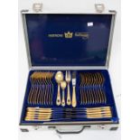 An aluminium cased, ten-piece, gold-plated Bestecke Solingen canteen of cutlery, made in Germany ***