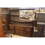 An early 18th Century joined oak dresser base and rack, probably made during the reign of Queen Anne