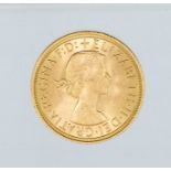 A 1958 Elizabeth II gold sovereign.
