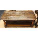 A traditional oak coffee table, late 20th Century, of pegged mortise and tenon construction, plank