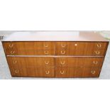 A G-plan teak chest of drawers, 66cm high, 149cm wide, 46cm deep