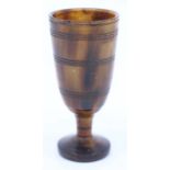 A rhino horn goblet, 8cm high, with banded detail