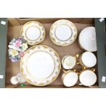 A collection of Mintons white and gold tea wares, plates, tea cups, saucers, etc with Crown