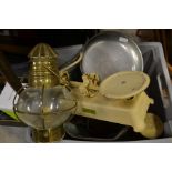 A collection of brass wares including brass hanging oil lamp, scales, figures, along with plated