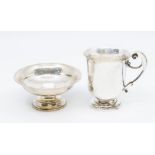 An Edwardian plain silver christening mug, by James Dixon & Sons, Sheffield, 1901 and a circular