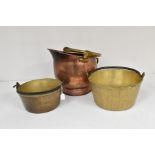 A collection of metalware comprising a copper and brass coal bucket and two brass jam pans. Diameter