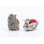 A modern small silver Owl pin cushion together with a small duck pin cushion, both hallmarked by TA,