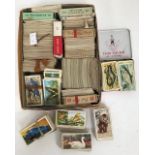 A collection of cigarette and tea cards