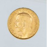 A 1912 George V gold sovereign, London mint.