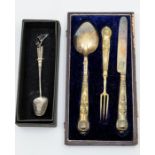 A George III matched three piece silver Queens pattern christening set, the spoon and fork by Taylor