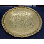 4 brass trays including 2 with leaf/floral pattern, 1 with maritime design and 1 with Middle East