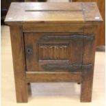 A 16th Century style side cabinet, fitted with a single door, joined construction, iron strap