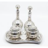 An Art Nouveau glass and Sterling silver overlaid dressing table set, comprising a pair of scent