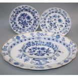 A mostly Meissen blue and white onion pattern part dinner service, comprising ten plates, large meat