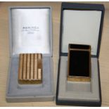 A gold plated Dupont cigarette lighter in fitted Hermes box, numbered AHC599, together with a Dupont