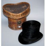 An Edwardian silk Top Hat, in a stitched leather hat box. Internal measurements 19 x 15.5cm