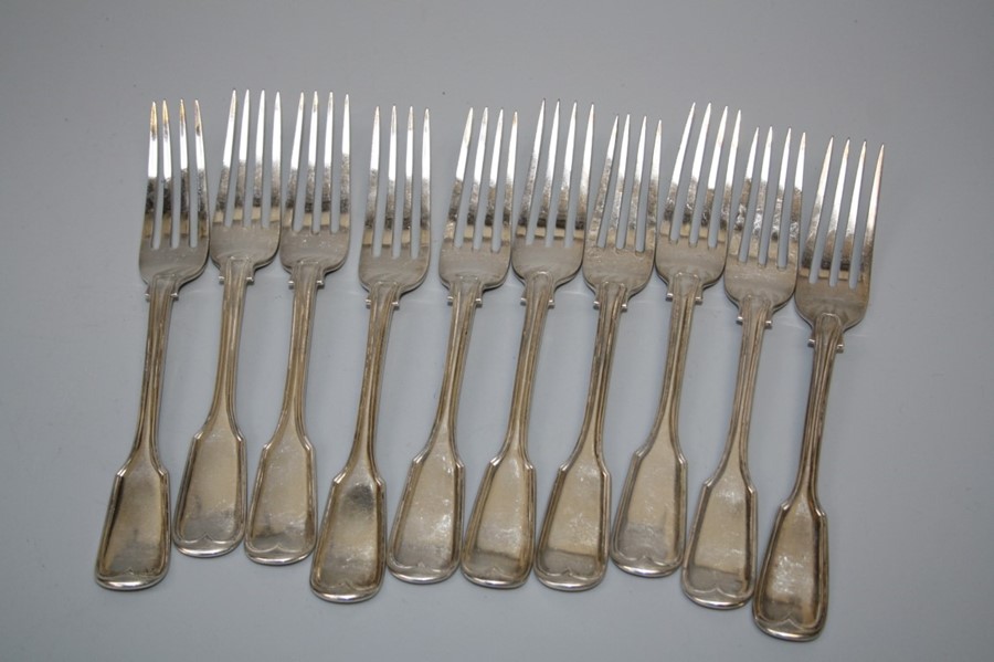 A composite set of ten Victorian silver fiddle and thread table forks, each bearing stag crest.