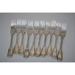 A composite set of ten Victorian silver fiddle and thread table forks, each bearing stag crest.