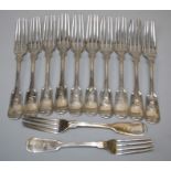A set of twelve white metal fiddle and thread table forks. Monogrammed LSB. 21 troy oz.