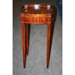 A George III Gallery topped mahogany urn stand with sliding candle stand, with satinwood stringing