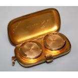 An early 20th century 9ct yellow gold double sovereign case bearing an entwined monogram, TWD,