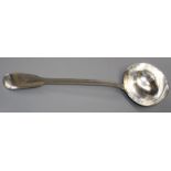 A Victorian cast silver "fiddle and thread" pattern soup ladle. bearing an armorial crest. London