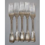 A composite part set of five Victorian silver fiddle and thread dessert forks, each bearing a stag