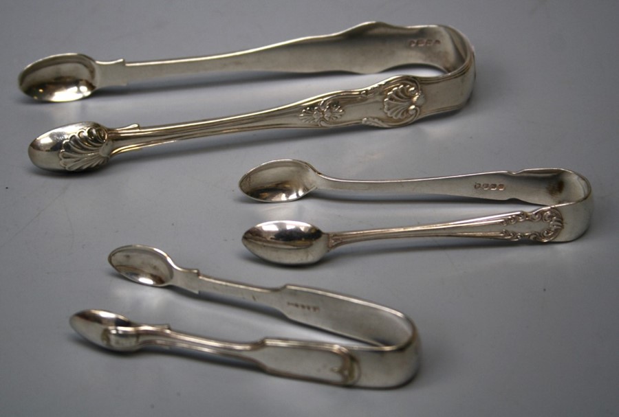 A pair of Victorian cast silver "Kings" pattern sugar bows . London 1850 by G Adams. 2.5 Troy oz.