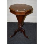 A Victorian, figured walnut, octagonal trumpet work table.