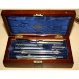 A.G. Thornton, Manchester, a 1930's mahogany cased set of technical drawing instruments. The tray