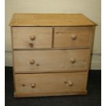 A 19th century stripped pine chest of 2 short and 2 long drawers with knop handles on plinth. 93 x