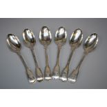 A composite but matching set of six Victorian silver fiddle and thread soup spoons. London 1841 by