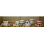 A small collection of trios, cabinet cups and saucers including Coalport, Limoges, Doulton, Wedgwood