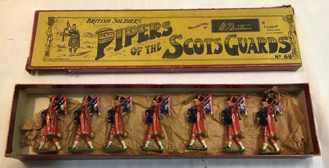 Britains: A boxed, Britains, Pipers of the Scots Guards, No. 69, circa 1930. Excellent condition