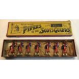 Britains: A boxed, Britains, Pipers of the Scots Guards, No. 69, circa 1930. Excellent condition