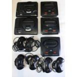 Sega: A collection of assorted unboxed Sega Mega Drive and Mega Drive II consoles, together with