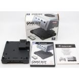 Nintendo: A boxed Nintendo Gameboy Player in black, original box, complete with instructions and