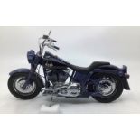 Franklin Mint: A boxed Harley Davidson Blues Missile by Franklin Mint. Boxed with papers and tag.