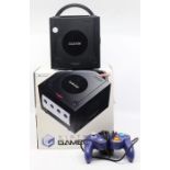 Nintendo: A boxed Nintendo Gamecube console, black, with instructions; together with a collection of