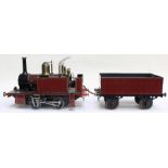 Locomotive: A 3 1/2 inch gauge, 0-4-0, Tank Locomotive and Tender, No. 985, finished in maroon