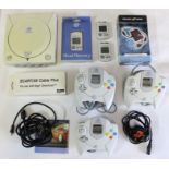 Sega: A collection of assorted Sega Dreamcast items to include: an unboxed console, a boxed Visual